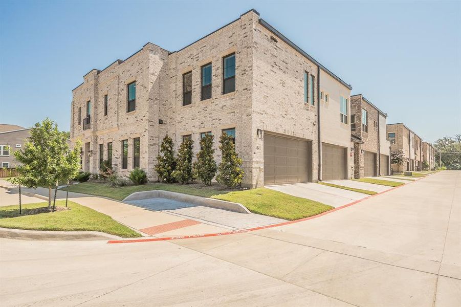 Front exterior of a new home in Parkland, Fort Worth, TX, highlighting curb appeal (Image 18). Front exterior of a new home in Parkland, Fort Worth, TX, highlighting curb appeal (Image 18).