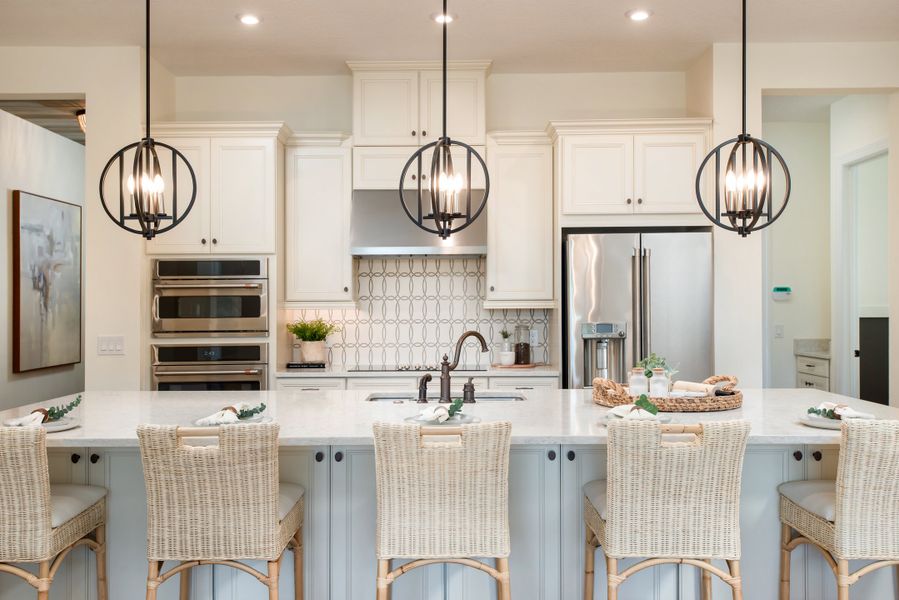 Representative furnished interior of a home built from the Ambra by Taylor Morrison in Esplanade Lake Club, Fort Myers (Image 7).