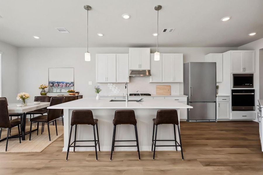 Photo is not of the actual home, but is an inspirational photo of builder’s model home and may depict options, furnishings, and/or decorator features that are not included