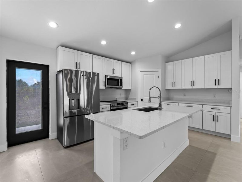 Furnished interior view inside a new home in , Port Charlotte (Image 9).