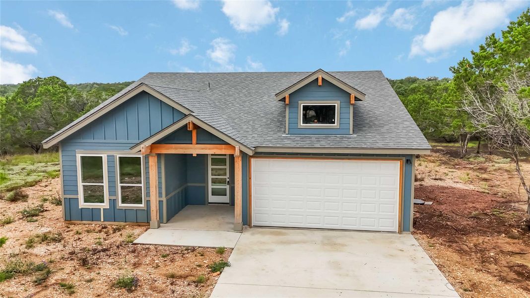 Front exterior of a new home in , Wimberley, TX, highlighting curb appeal (Image 1). Front exterior of a new home in , Wimberley, TX, highlighting curb appeal (Image 1).