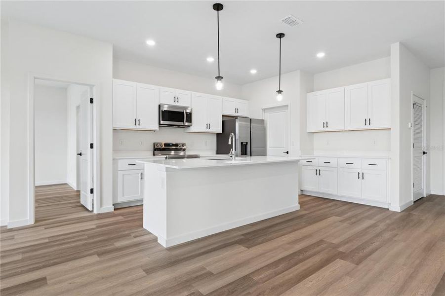Furnished interior view inside a new home in Palm Coast, Palm Coast (Image 7). Furnished interior view inside a new home in Palm Coast, Palm Coast (Image 7).