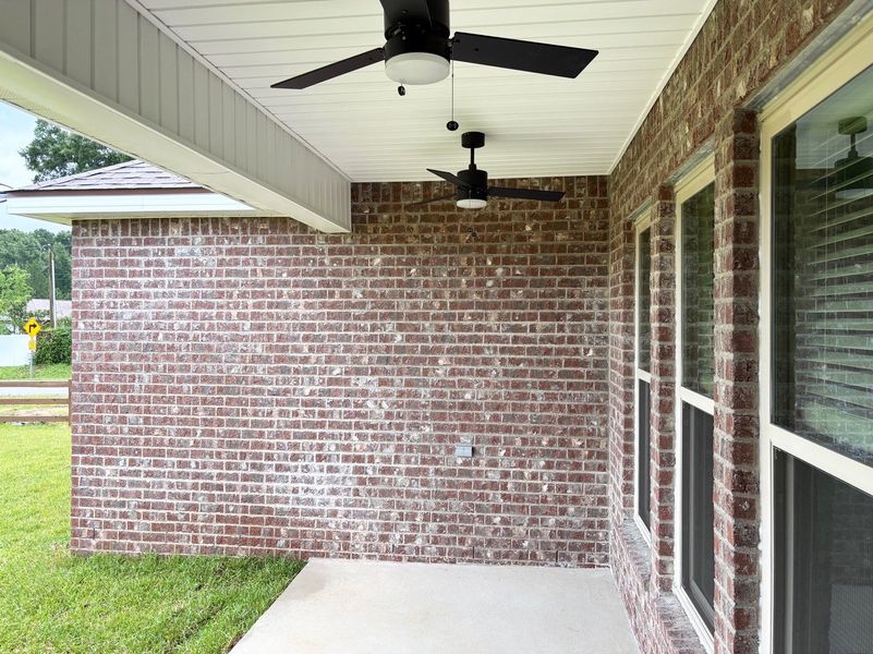 Exterior details and patio area of a home in Young Oaks, Crestview (Image 4).