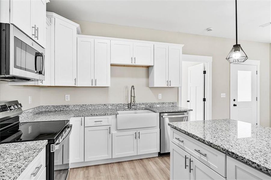 Furnished interior view inside a new home in , Dalton (Image 7).