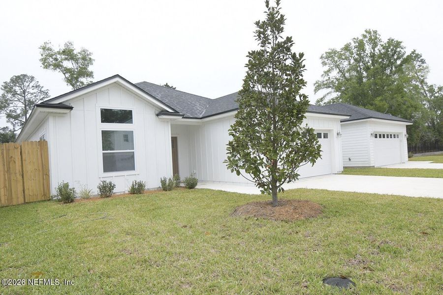 Front exterior of a new home in , Jacksonville, FL, highlighting curb appeal (Image 25).