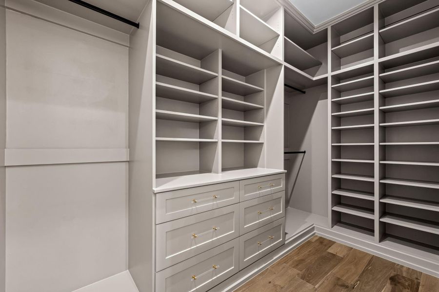 One of two primary closets One of two primary closets