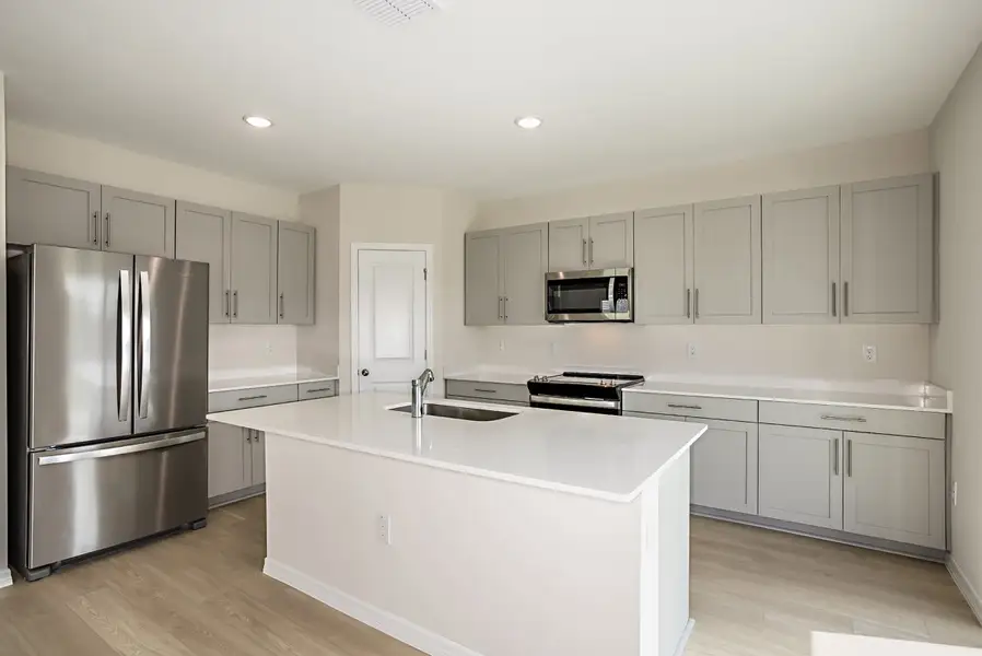 Furnished interior view inside a new home in Scenic Terrace, Haines City (Image 3).