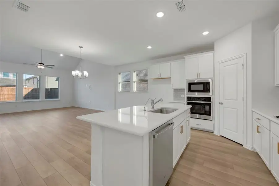 Furnished interior view inside a new home in Lily Creek at Sutton Fields, Aubrey (Image 11).