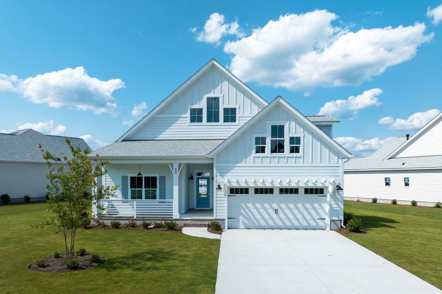 Representative exterior photo of a completed home built from the Kauai by Bill Clark Homes in Osprey Landing, Southport, NC (Image 25). Representative exterior photo of a completed home built from the Kauai by Bill Clark Homes in Osprey Landing, Southport, NC (Image 25).