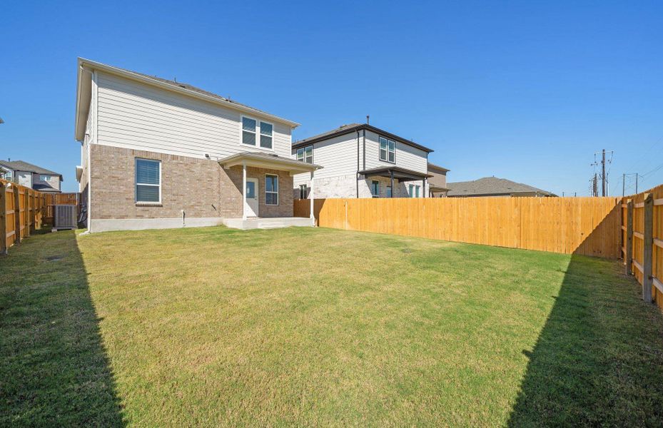 Exterior details and patio area of a home in Crosswinds, Kyle (Image 17). Exterior details and patio area of a home in Crosswinds, Kyle (Image 17).