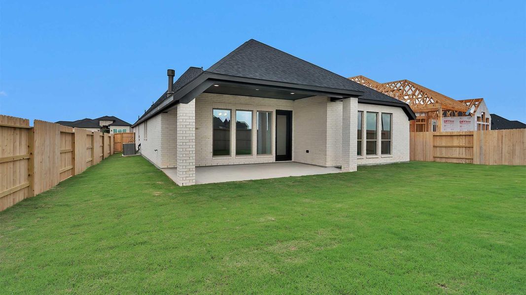 Exterior details and patio area of a home in Grange, Katy (Image 4).
