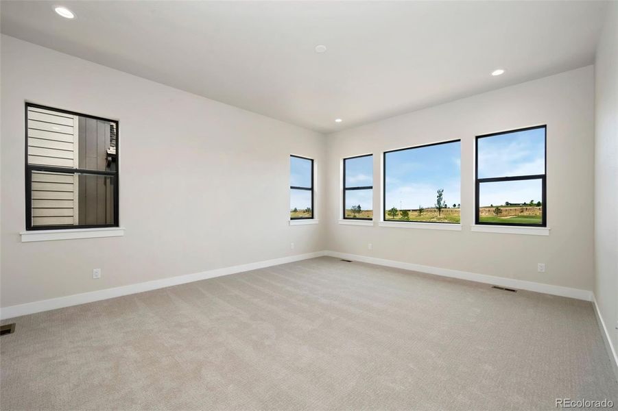 Spacious, unfurnished interior of a new home in The Fairways at RainDance, Windsor (Image 18).