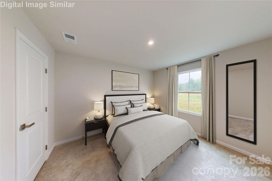 Convenient first-floor bedroom with adjoining full bath - perfect for hosting guests or accommodating multi-generational living with comfort and privacy.
