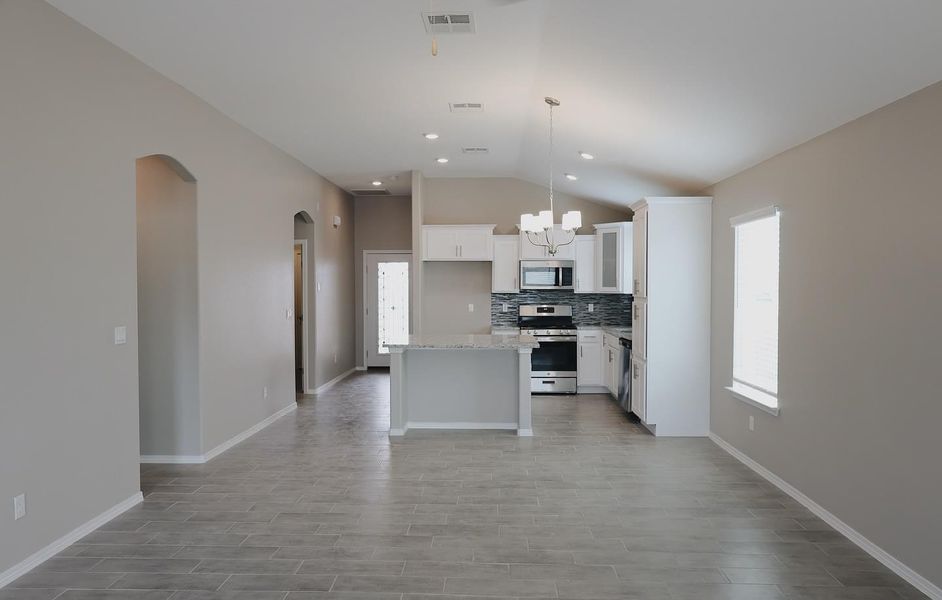 Representative furnished interior of a home built from the Madison 1487 SSC by Saratoga Homes in Crossland, El Paso (Image 5).