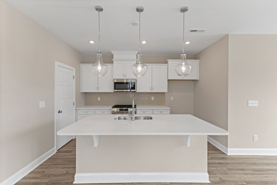 Representative furnished interior of a home built from the The Juniper by RobuckHomes in Kennebec Crossing, Angier (Image 19).