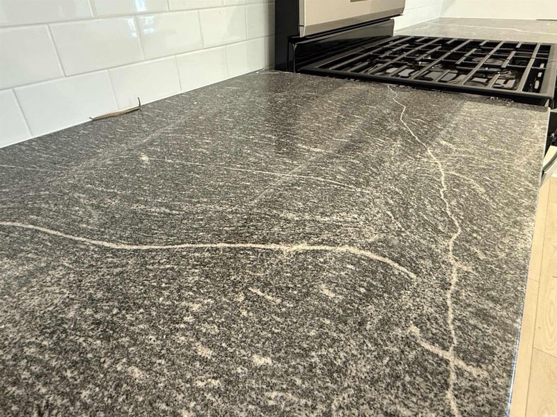 Washroom with light wood-style floors, electric dryer hookup, and hookup for a washing machine Washroom with light wood-style floors, electric dryer hookup, and hookup for a washing machine