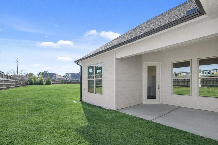 Exterior details and patio area of a home in Soleil Summit Chase, Snellville (Image 4).