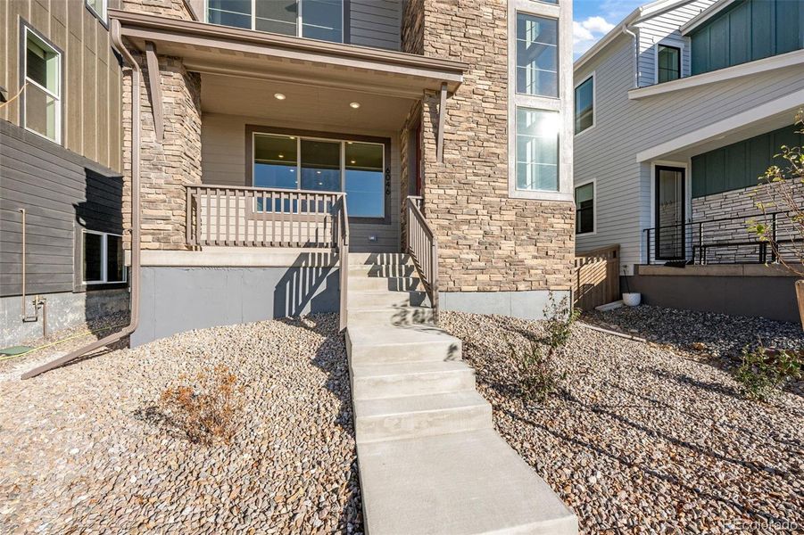 Exterior details and patio area of a home in Painted Prairie, Aurora (Image 23). Exterior details and patio area of a home in Painted Prairie, Aurora (Image 23).