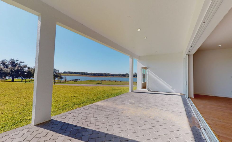 Exterior details and patio area of a home in West Hill Estates, Dade City (Image 22).