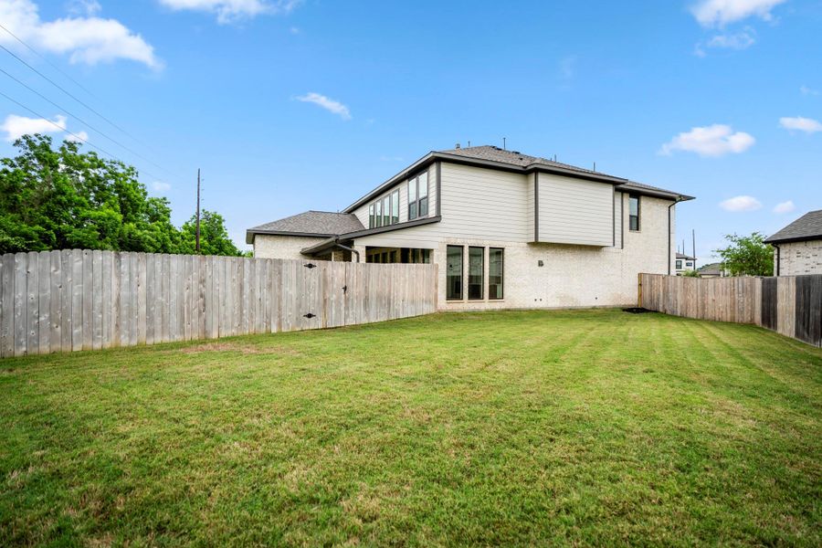 Exterior details and patio area of a home in Fulbrook on Fulshear Creek, Fulshear (Image 3).