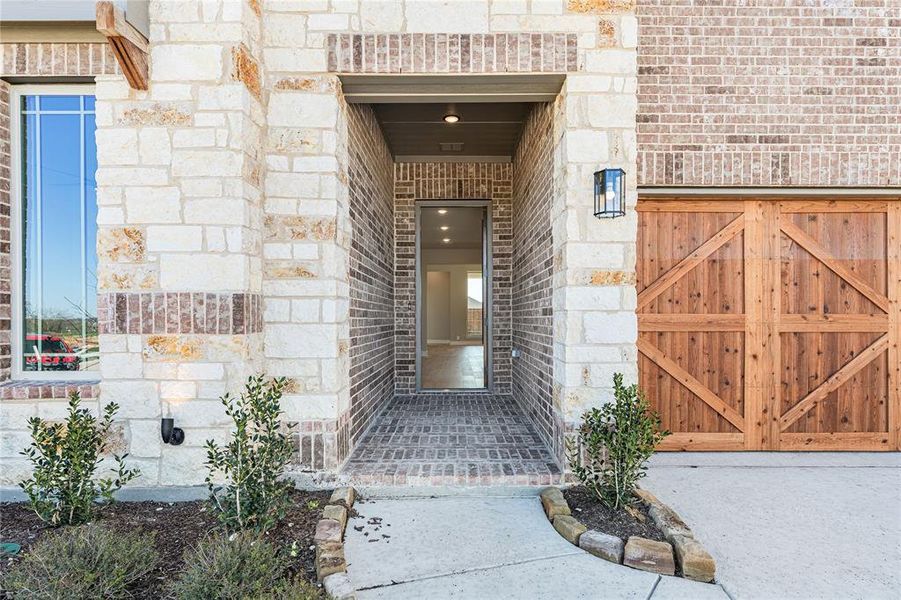 Exterior details and patio area of a home in The Oaks, Red Oak (Image 3).