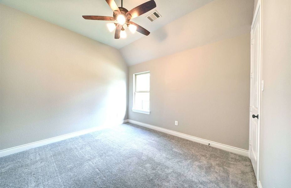 Representative unfurnished interior of a home built from the 3030 by Ravenna Homes in The Woodlands Hills 65′, Willis (Image 45). Representative unfurnished interior of a home built from the 3030 by Ravenna Homes in The Woodlands Hills 65′, Willis (Image 45).