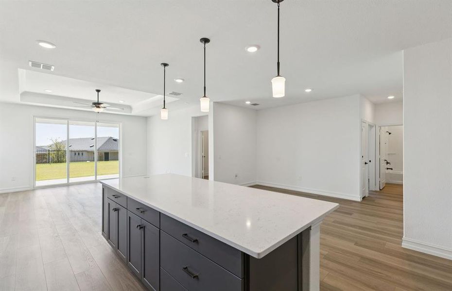 Bright kitchen with an expansive center island perfect for gathering