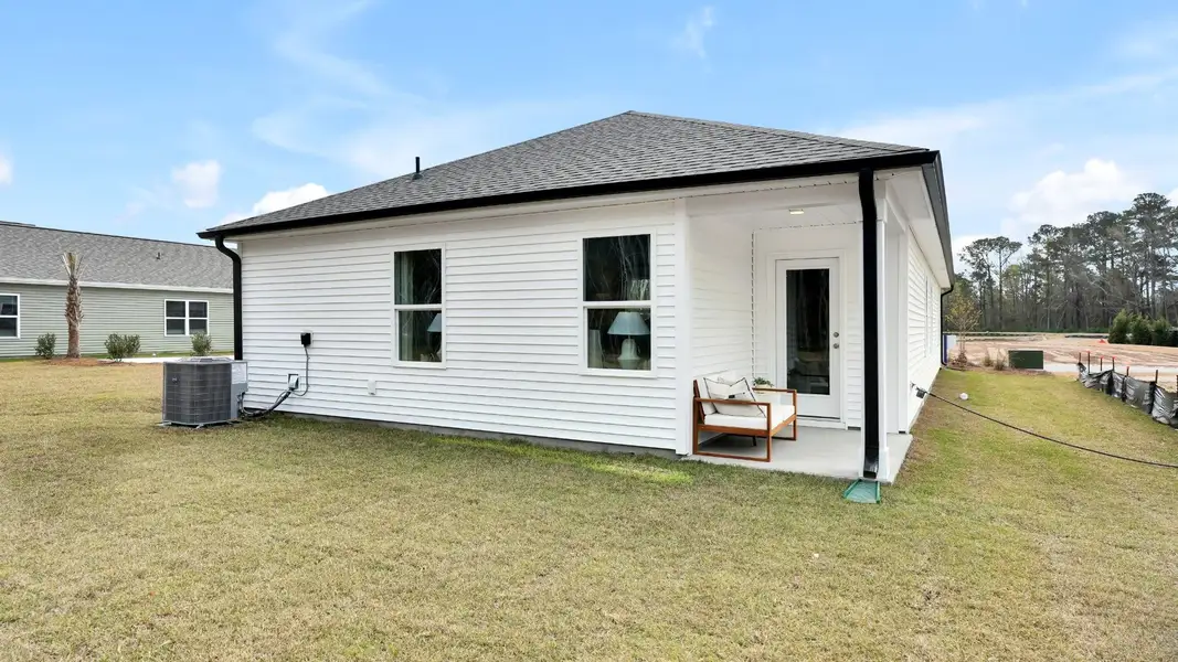 Exterior details and patio area of a home in Saltgrass Landing, Winnabow (Image 3).