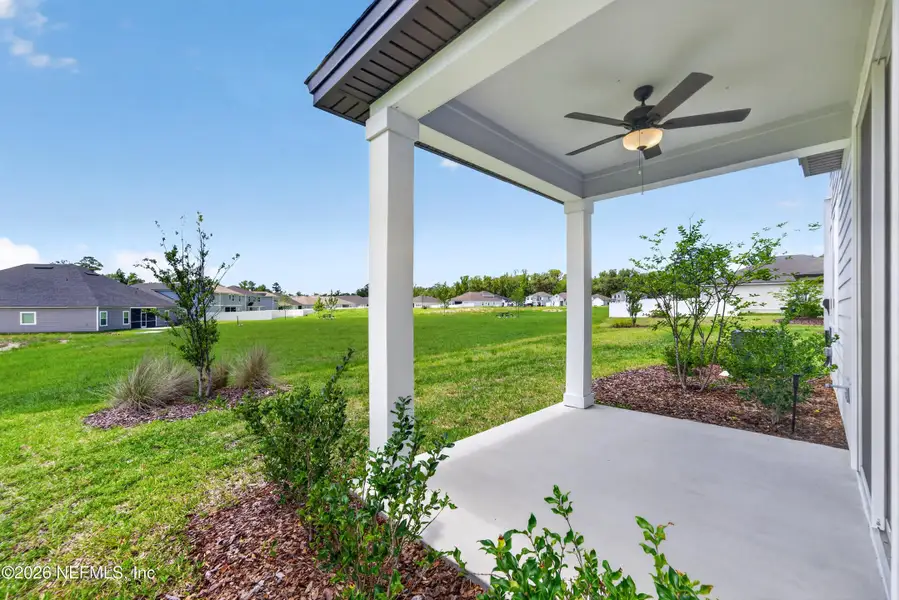 Exterior details and patio area of a home in , Middleburg (Image 3).