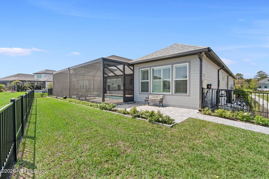 Exterior details and patio area of a home in Marshes of Madeira, St. Augustine (Image 31). Exterior details and patio area of a home in Marshes of Madeira, St. Augustine (Image 31).