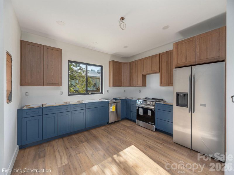 Furnished interior view inside a new home in , Waynesville (Image 3).