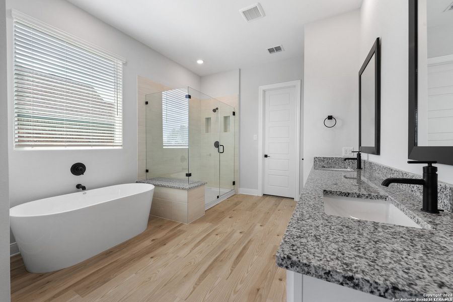 Furnished interior view inside a new home in Potranco West, Castroville (Image 8).