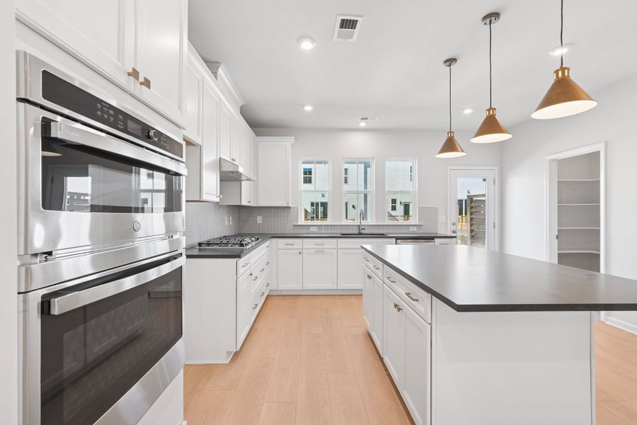 Representative furnished interior of a home built from the Nola by Tri Pointe Homes in The Grove at Latta Park, Durham (Image 3).