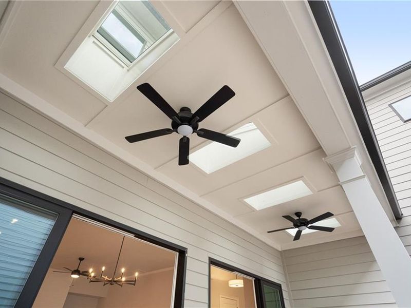 Exterior details and patio area of a home in The Village at Towne Lake, Woodstock (Image 29).