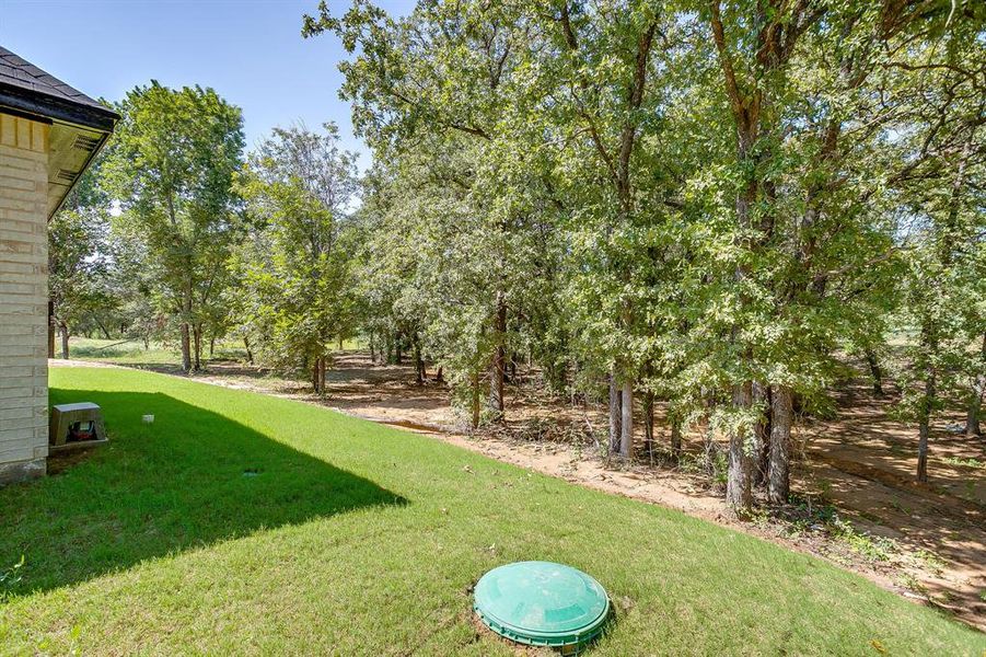 Front exterior of a new home in Escondido Ranches, Poolville, TX, highlighting curb appeal (Image 21). Front exterior of a new home in Escondido Ranches, Poolville, TX, highlighting curb appeal (Image 21).