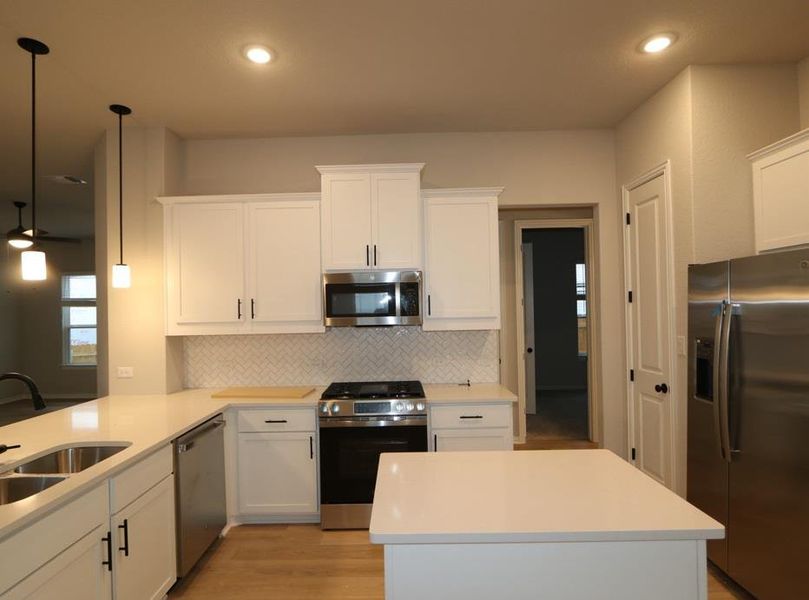 Furnished interior view inside a new home in Heritage, Dripping Springs (Image 6). Furnished interior view inside a new home in Heritage, Dripping Springs (Image 6).