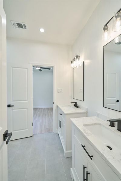 Shared Secondary Bathroom with access from both rooms