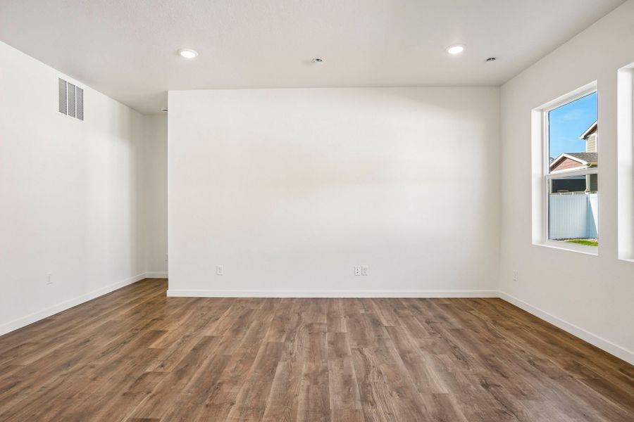 Spacious, unfurnished interior of a new home in Union Colony West, Greeley (Image 46).