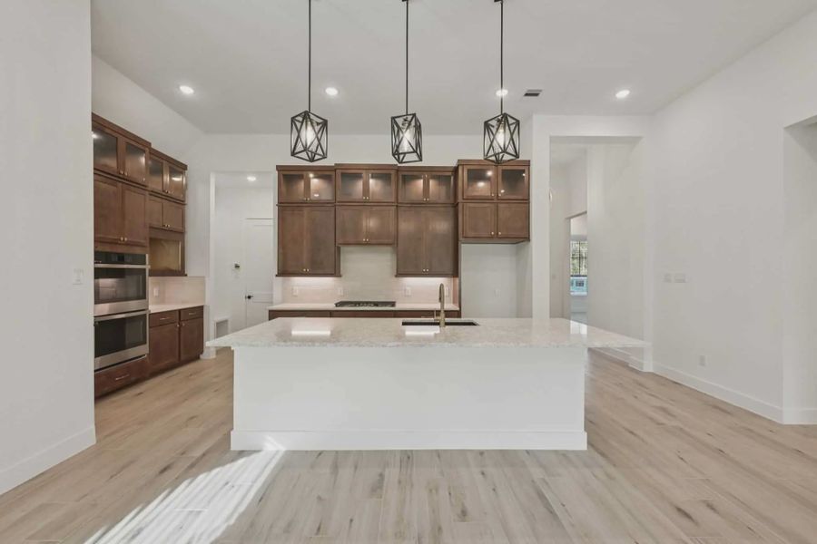 Representative furnished interior of a home built from the Summerton by Chesmar Homes in Lakes of Cane Island, Katy (Image 5). Representative furnished interior of a home built from the Summerton by Chesmar Homes in Lakes of Cane Island, Katy (Image 5).