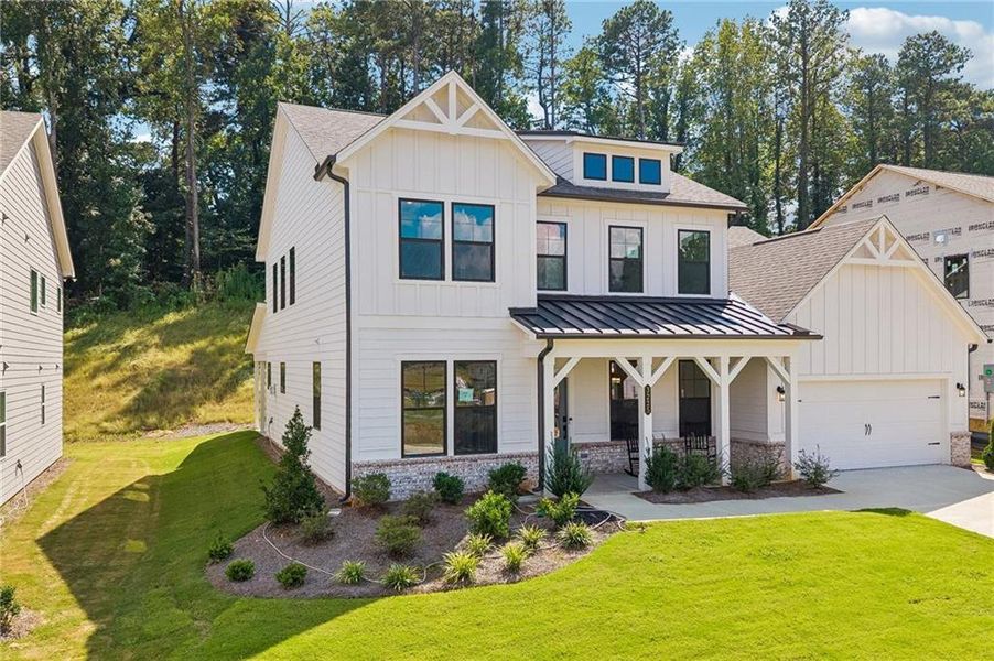 Front exterior of a new home in Reserve at Hickory Walk, Kennesaw, GA, highlighting curb appeal (Image 1). Front exterior of a new home in Reserve at Hickory Walk, Kennesaw, GA, highlighting curb appeal (Image 1).