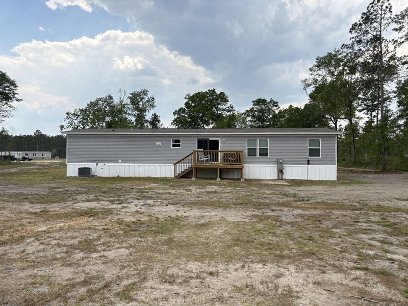 Exterior details and patio area of a home in , Cottageville (Image 21).