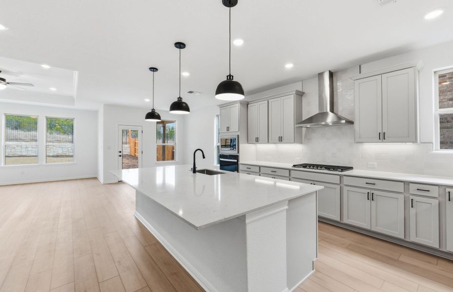 Furnished interior view inside a new home in West Cypress Hills, Spicewood (Image 11).