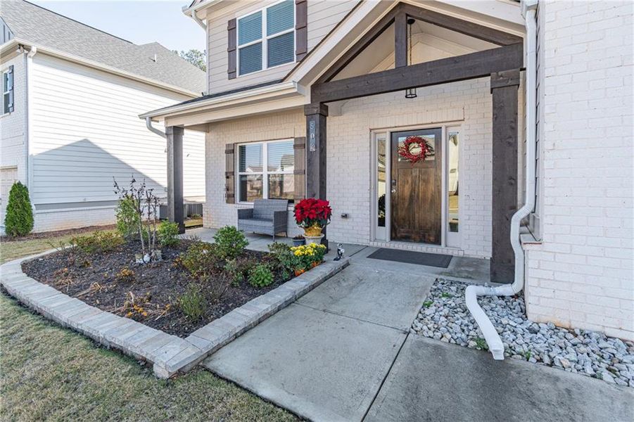 Exterior details and patio area of a home in Enclave at Brookside Crossing, Auburn (Image 25).