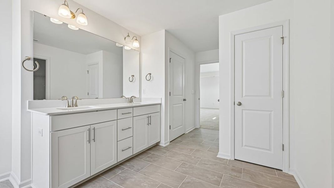 Furnished interior view inside a new home in Eagle Creek, Fuquay Varina (Image 10).
