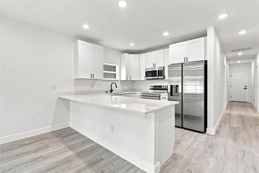 Furnished interior view inside a new home in , Deland (Image 8).