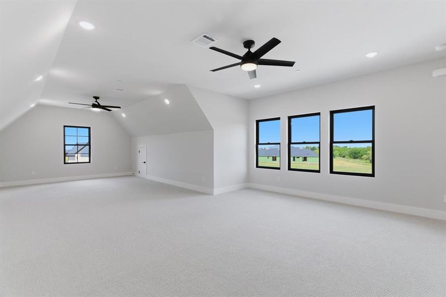 Flexible Upstairs Space serves as a Great Game Room with Room for TV or Play Space