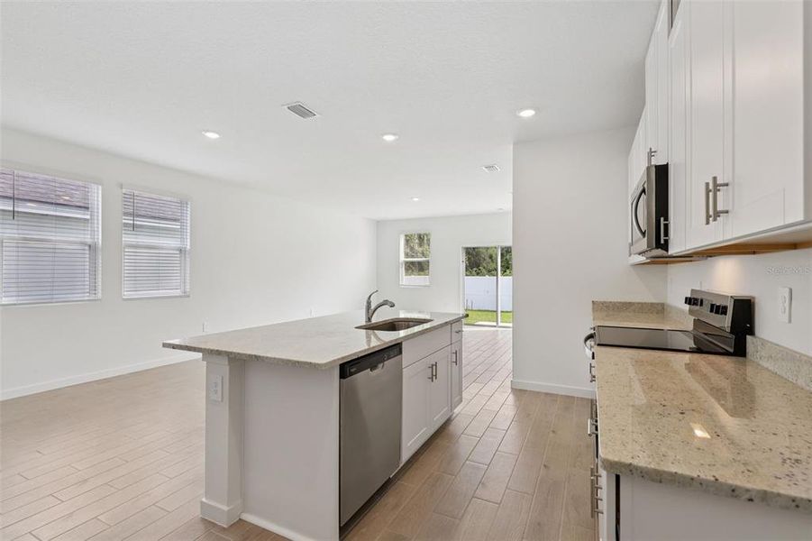 Furnished interior view inside a new home in Flagler Village - Classic Series, Palm Coast (Image 5).