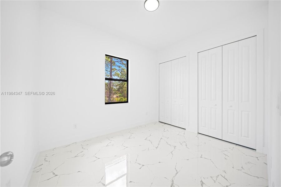 Spacious, unfurnished interior of a new home in , Lehigh Acres (Image 16).
