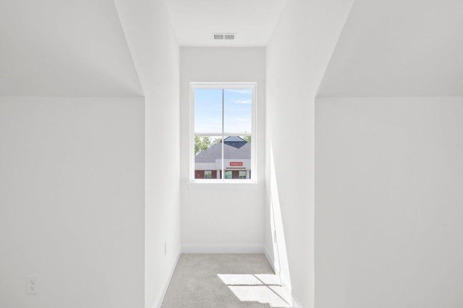 Spacious, unfurnished interior of a new home in Downtown Loris Homes, Loris (Image 25).