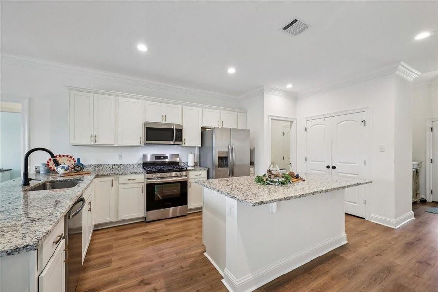 Furnished interior view inside a new home in , Orange (Image 14). Furnished interior view inside a new home in , Orange (Image 14).